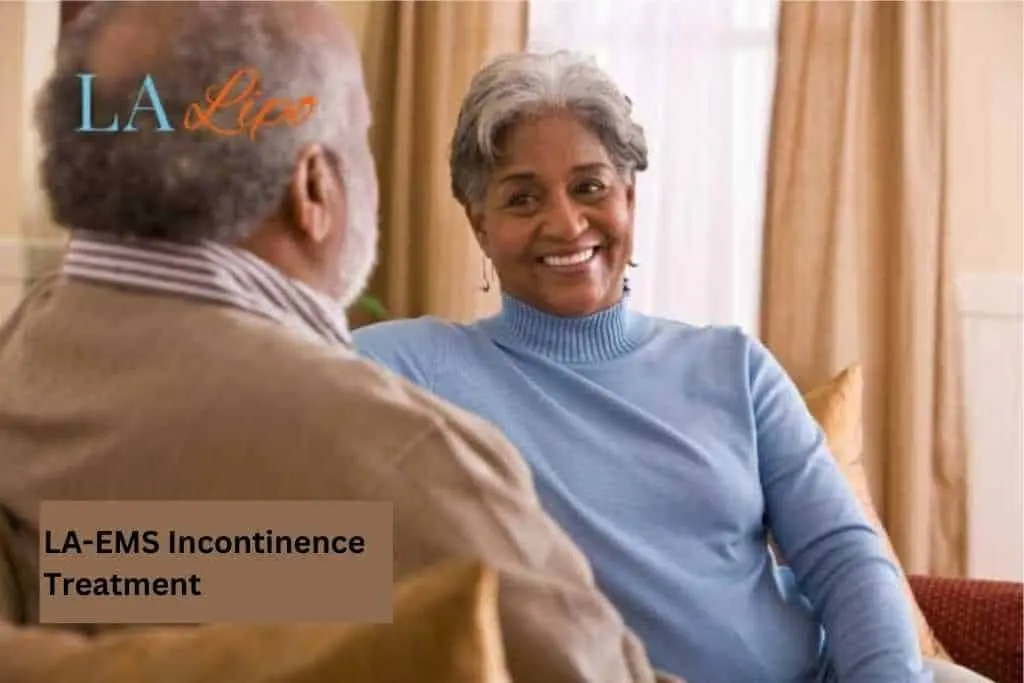 Couple sat smiling at each other - LA-EMS treatment Berkshire