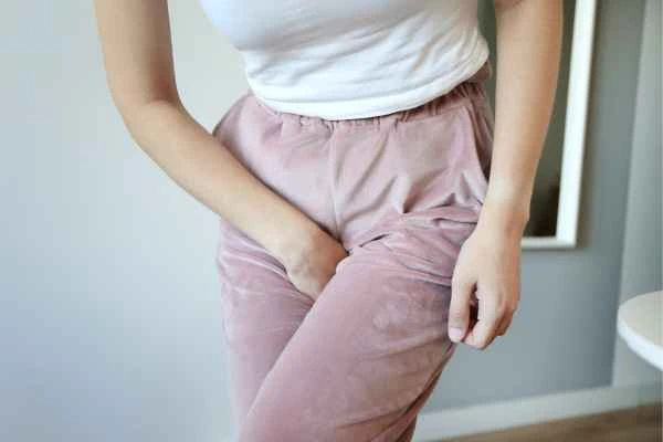 woman running for the toilet because of urinary incontinence Berkshire